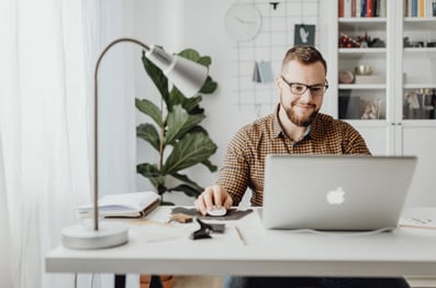Man working in front of his computer.